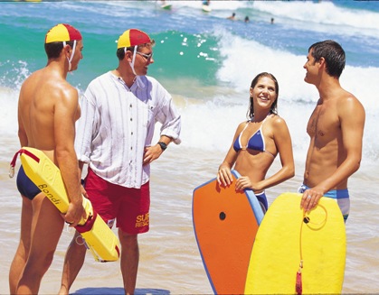 Photo: Couple with life savers at Bondi Beach. Courtesy Tourism New South Wales